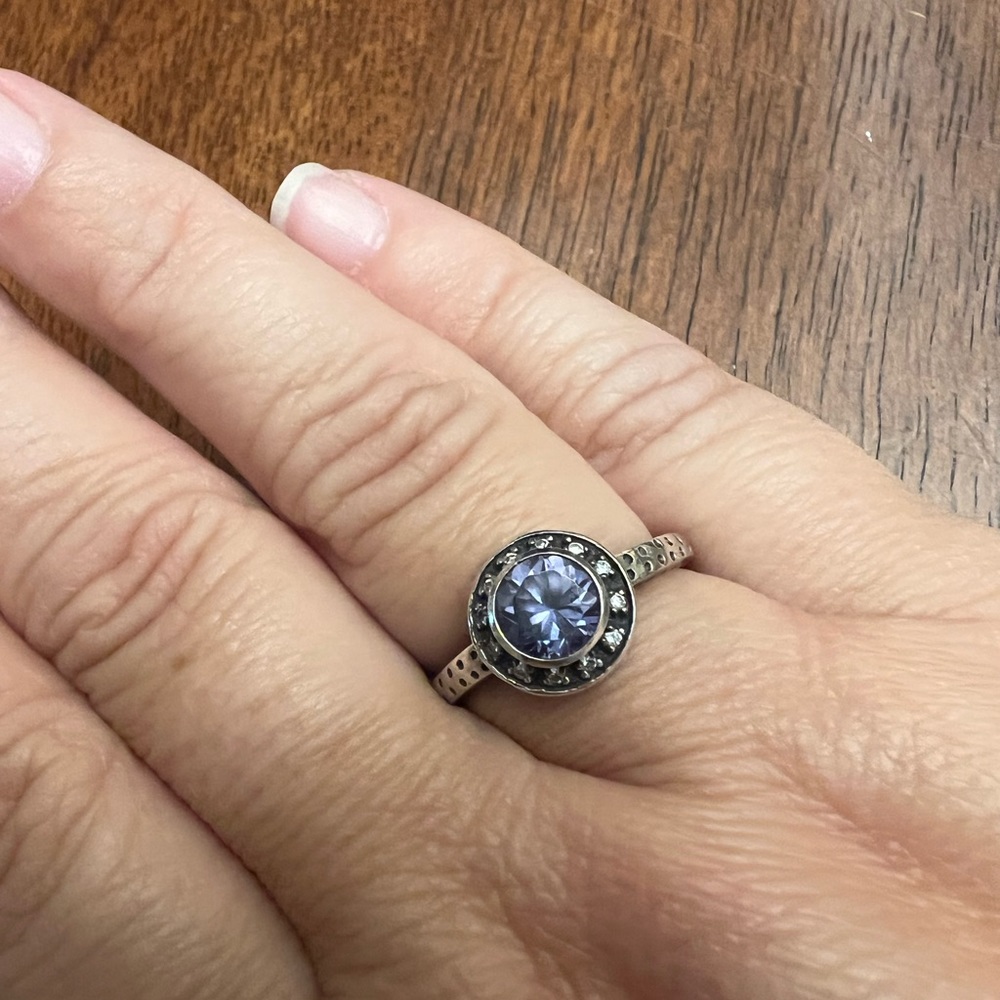 Sterling silver with lavender and clear stones size 8